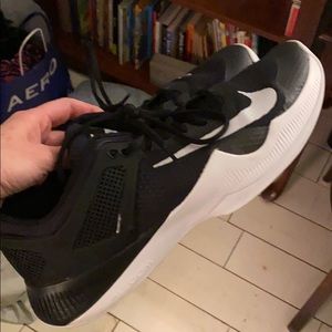 SZ 12 womans black and white Nike Volleyball shoes